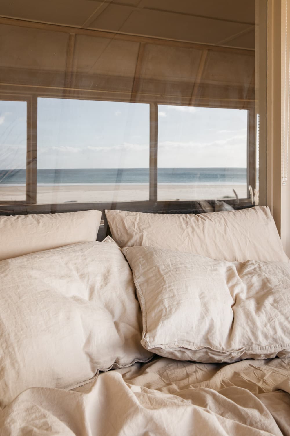 Bed with reflection of beach