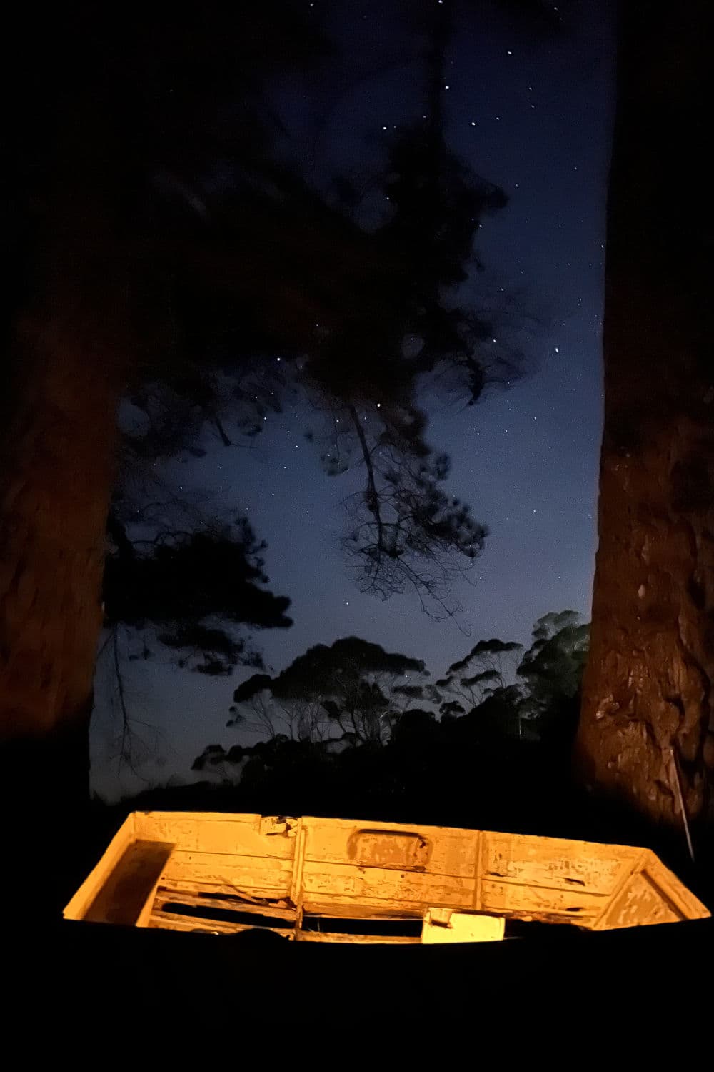 A boat at night illumiated from within